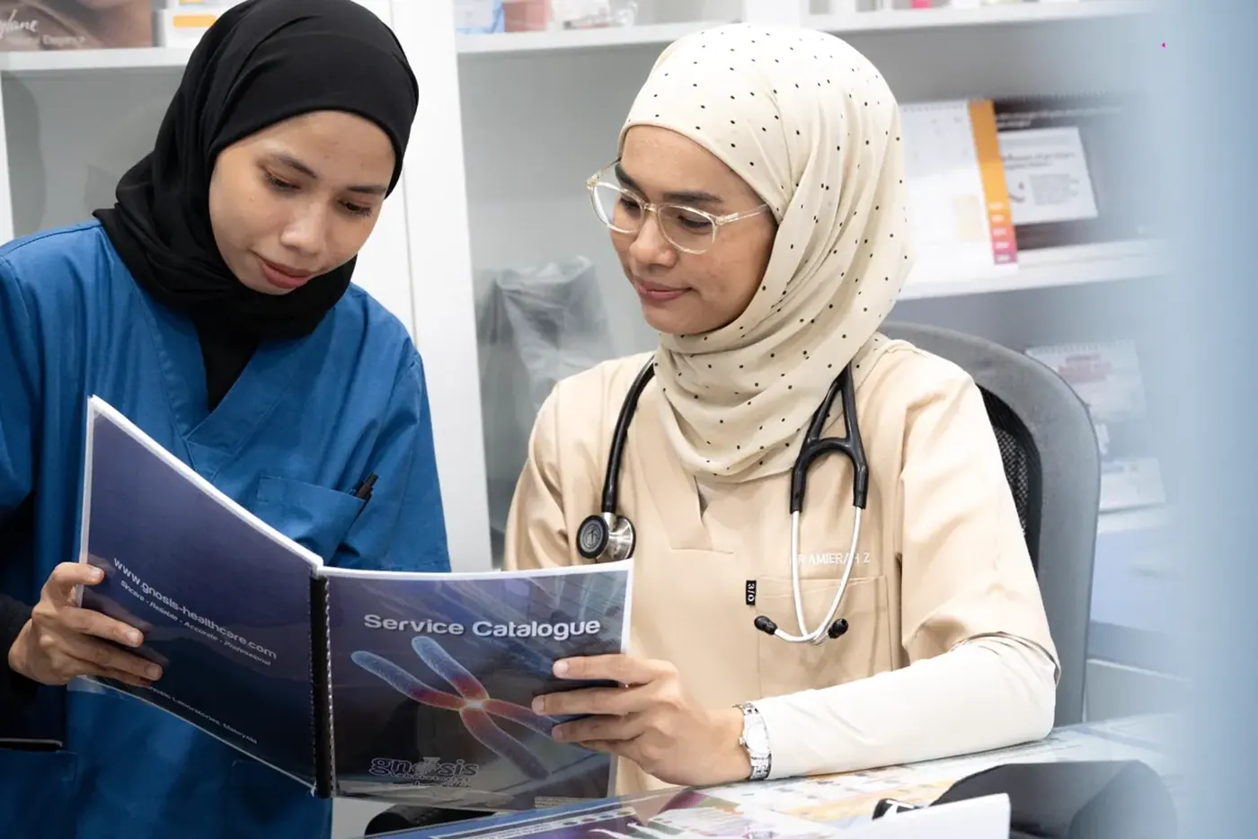 A doctor and nurse at Klinik Astracare, Taman Maluri